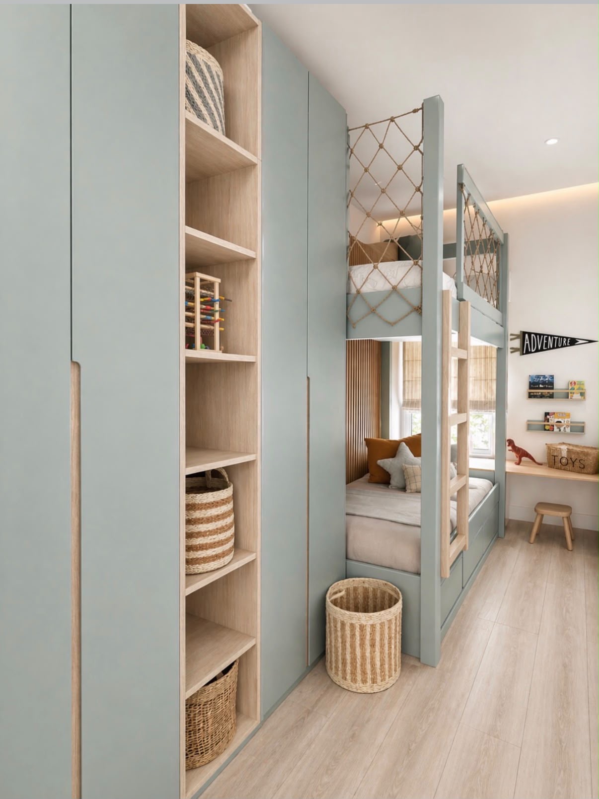Children's bedroom with sage green fitted wardrobes, bespoke bunk bed with rope detailing and oak shelving