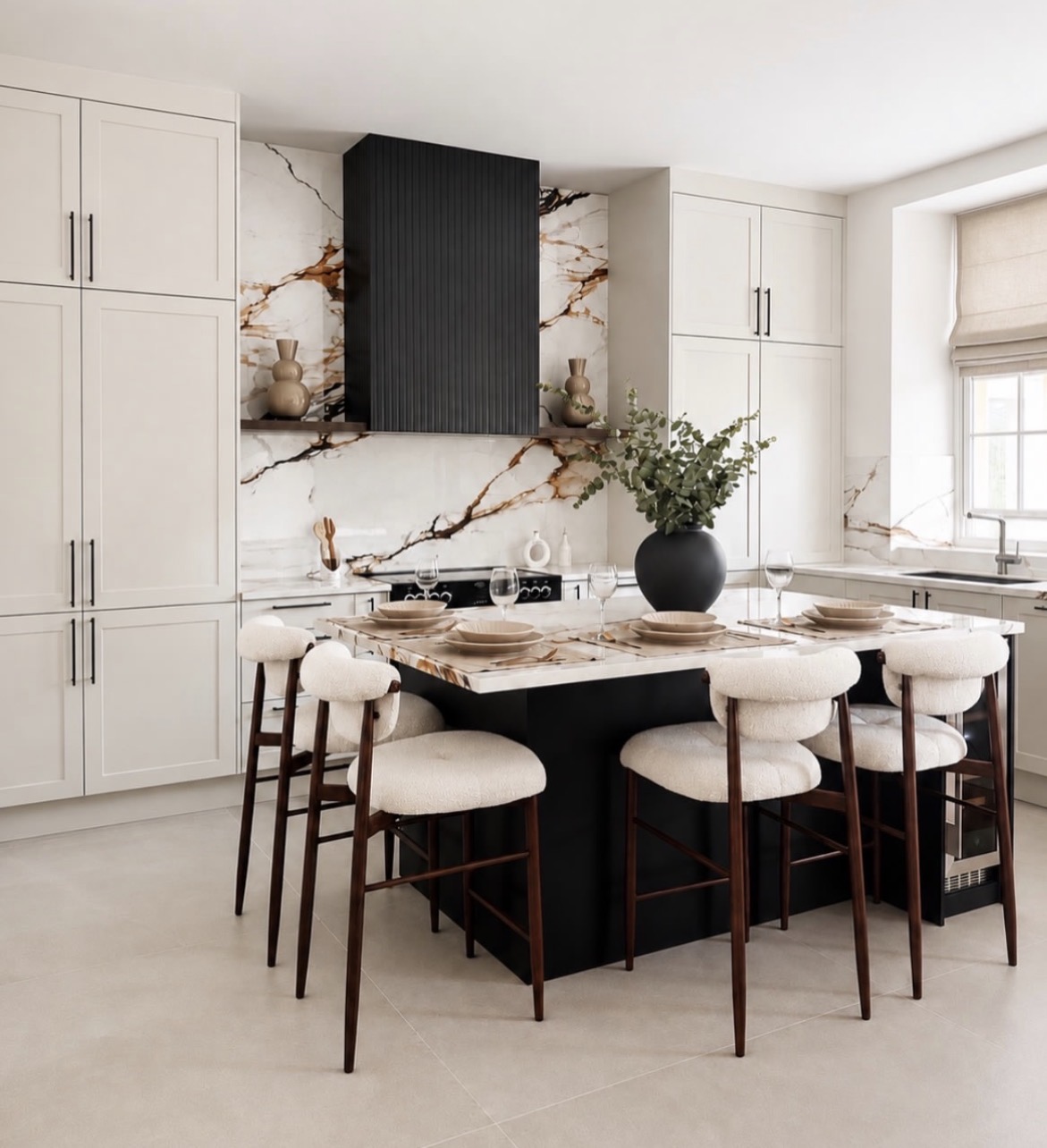Bespoke ivory shaker kitchen with fluted black island, marble worktops and bouclé bar stools